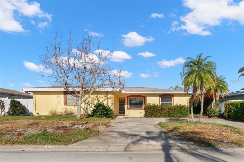 Discover the charm of coastal living in this waterfront property - Beach Home for sale in Treasure Island, Florida on Beachhouse.com