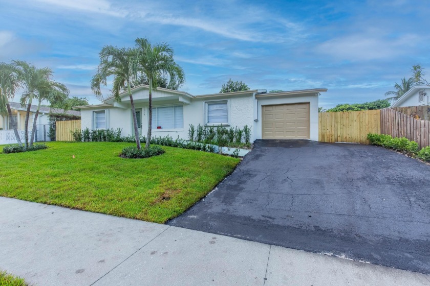 Experience modern living in this fully renovated Home! This - Beach Home for sale in Lake Worth Beach, Florida on Beachhouse.com