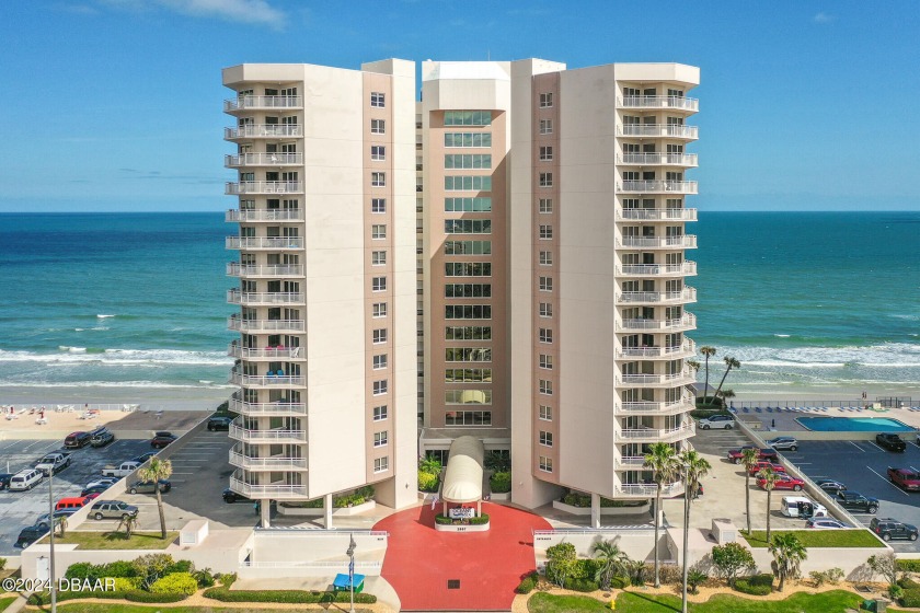 LOCATED ON THE SOUTHEAST CORNER OF THE ICONIC OCEANS SIX, THIS - Beach Condo for sale in Daytona Beach Shores, Florida on Beachhouse.com
