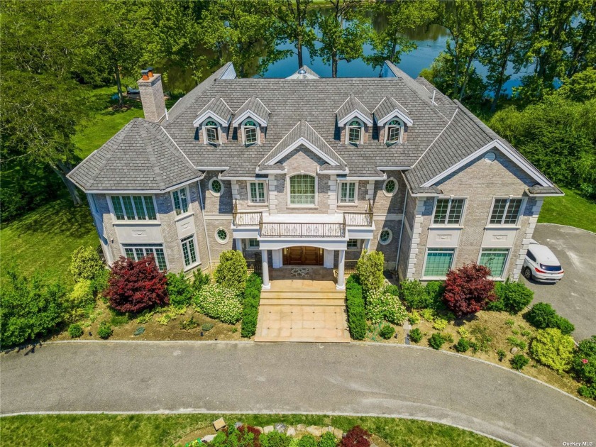 Picturesque Lakefront property. This breathtaking Custom Built - Beach Home for sale in Great Neck, New York on Beachhouse.com