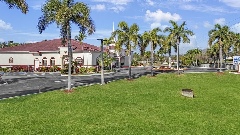 This stunning 8,644 SF building is situated on a meticulously - Beach Acreage for sale in Lake Worth, Florida on Beachhouse.com