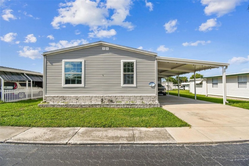 Stunning 3-Bedroom 2017 Manufactured Home in the Pointe West 55+ - Beach Home for sale in Largo, Florida on Beachhouse.com