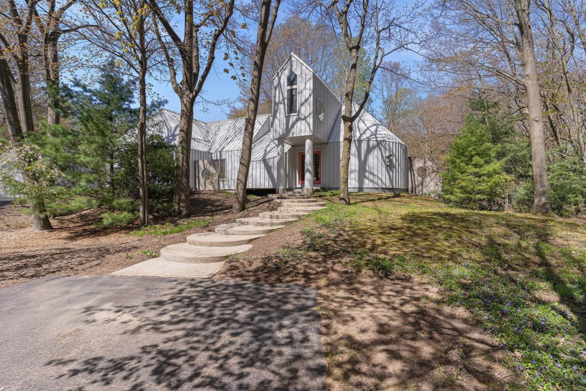 Enjoy living on 2.5 acres on a private road with a uniquely - Beach Home for sale in West Olive, Michigan on Beachhouse.com