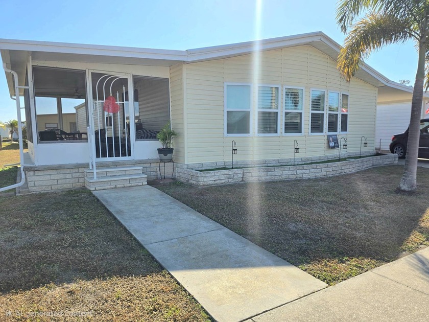 Welcome to this beautifully maintained and updated home in a - Beach Home for sale in North Fort Myers, Florida on Beachhouse.com