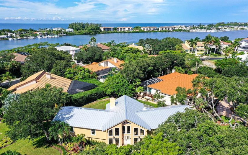 Nestled in the private gated community of The Bayou in Bay Isles - Beach Home for sale in Longboat Key, Florida on Beachhouse.com