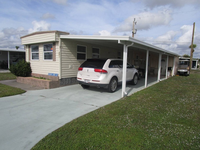 This beautiful turnkey 2 bedroom, 2 bath home is located in the - Beach Home for sale in North Fort Myers, Florida on Beachhouse.com