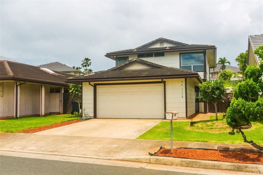 A delightful single-family home in the heart of Waipahu. This - Beach Home for sale in Waipahu, Hawaii on Beachhouse.com