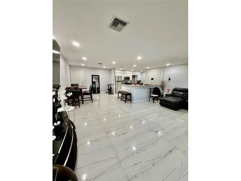 This spacious corner home 3 Beds and 2 full Bath has been - Beach Home for sale in Oakland Park, Florida on Beachhouse.com