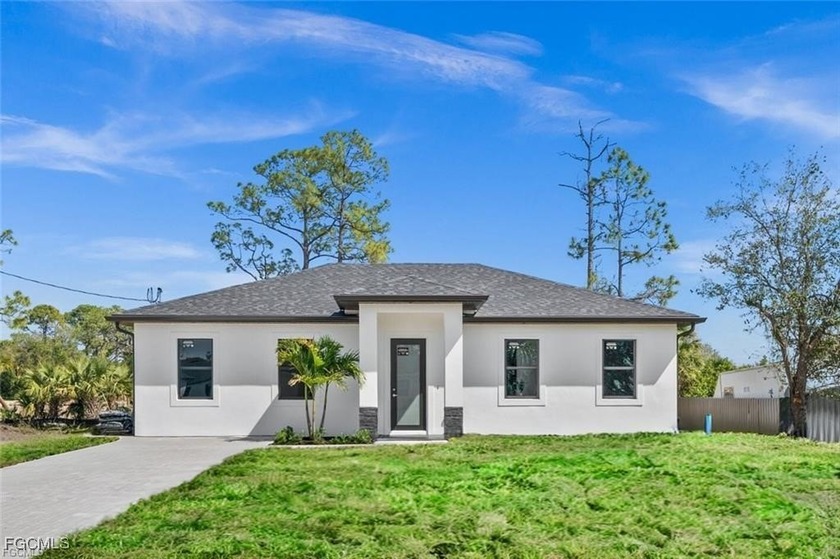Situated on a quiet street surrounded by newer homes, this - Beach Home for sale in Lehigh Acres, Florida on Beachhouse.com