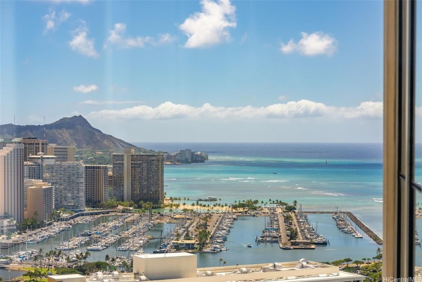 Rarely available: this elegant three-bedroom residence is - Beach Condo for sale in Honolulu, Hawaii on Beachhouse.com