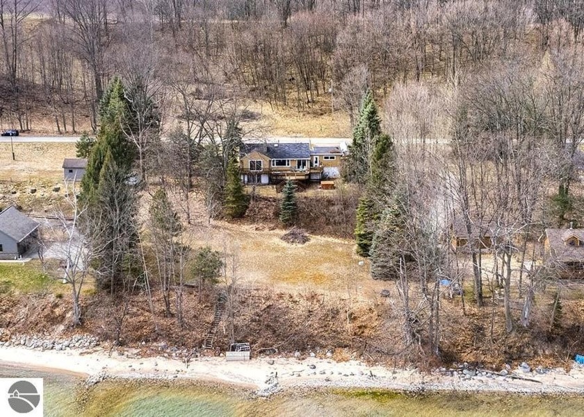 Just 11 miles out on the Old Mission Peninsula and convenient to - Beach Home for sale in Traverse City, Michigan on Beachhouse.com