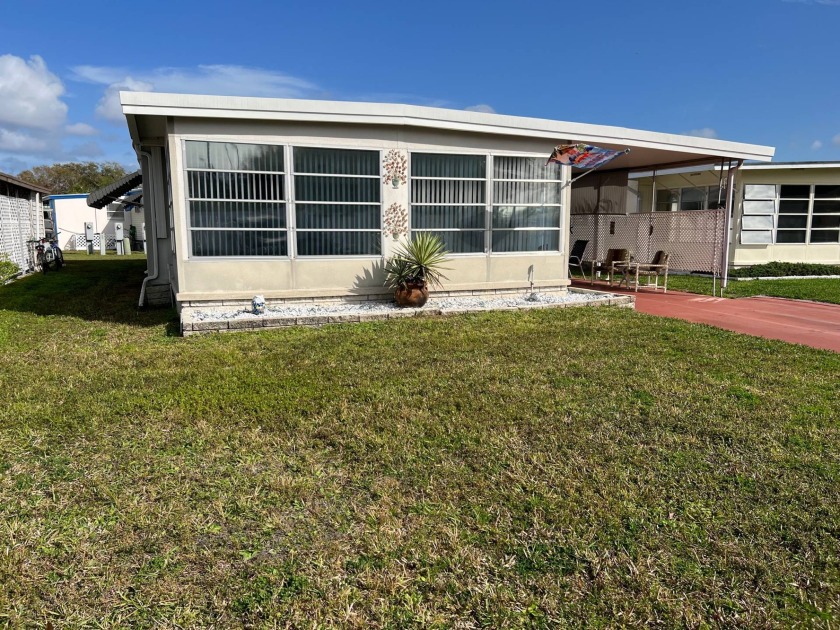 ONE OF THE BEST PRICED DOUBLEWIDES IN THE COMMUNITY! This - Beach Home for sale in Largo, Florida on Beachhouse.com