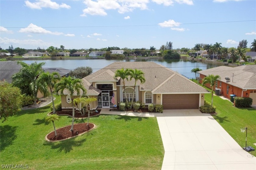 Welcome to this gorgeous SOUTHERN exposure heated pool home that - Beach Home for sale in Cape Coral, Florida on Beachhouse.com