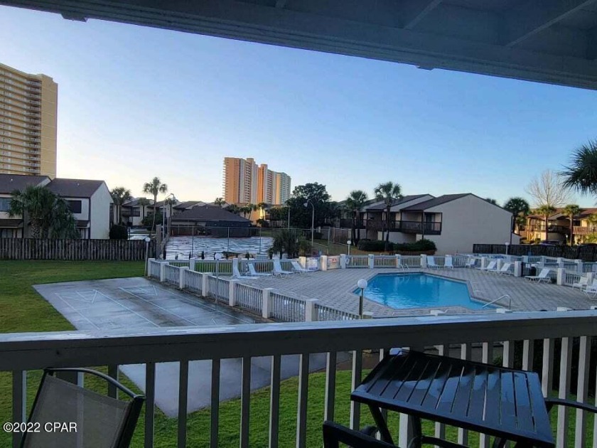 Walk the beach EVERY DAY while enjoying ownership of this clean - Beach Condo for sale in Panama City Beach, Florida on Beachhouse.com