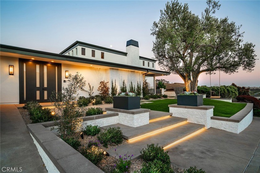 Prominently positioned in guard-gated Monarch Bay, this - Beach Home for sale in Dana Point, California on Beachhouse.com