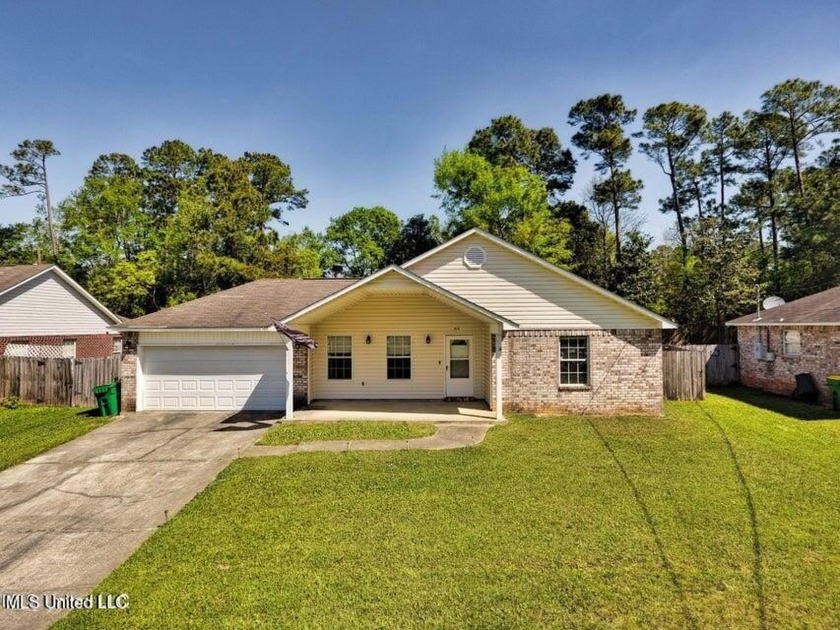 Welcome to this charming 4 bedroom 2 bath home located in the - Beach Home for sale in Ocean Springs, Mississippi on Beachhouse.com