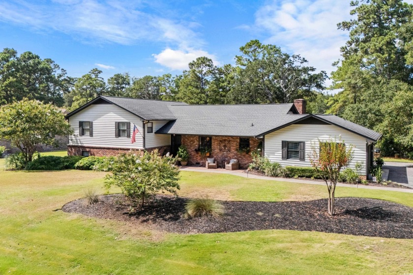 This one is a classic!  Introducing this artfully designed and - Beach Home for sale in Little River, South Carolina on Beachhouse.com