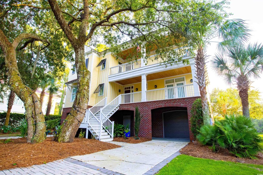 Timeless Lowcountry style meets modern coastal living in this - Beach Home for sale in Georgetown, South Carolina on Beachhouse.com