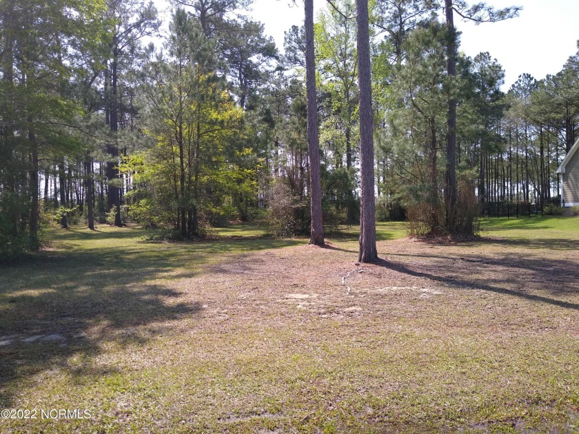 You have  found your dream in the Sun. This beautiful treed - Beach Lot for sale in Calabash, North Carolina on Beachhouse.com