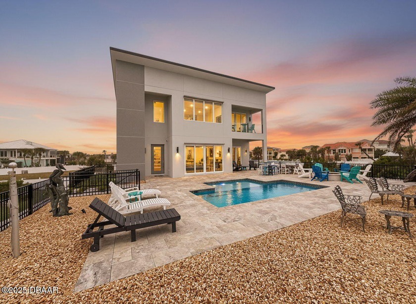 Welcome to a masterpiece of modern coastal design. This Custom - Beach Home for sale in Ormond Beach, Florida on Beachhouse.com