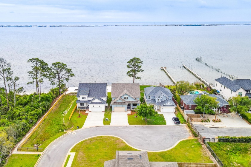 Welcome to your waterfront dream home! This stunning 4-bedroom - Beach Home for sale in Navarre, Florida on Beachhouse.com