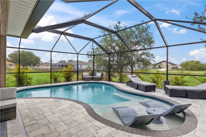 Welcome to 927 NW 12th Ter, Cape Coral - a beautifully pool home - Beach Home for sale in Cape Coral, Florida on Beachhouse.com