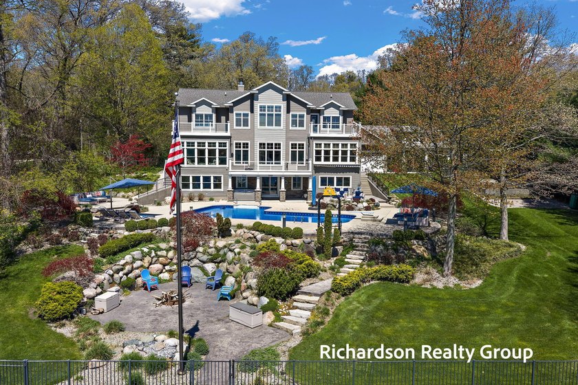 Fully renovated in 2022 this RARE, Turn Key, 7bd, 7bath, 7 stall - Beach Home for sale in Grand Haven, Michigan on Beachhouse.com