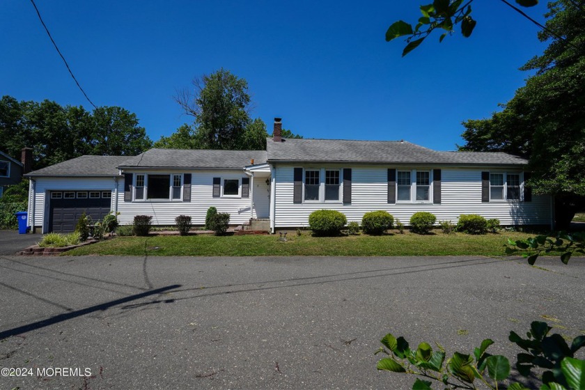 LOCATION, LOCATION, LOCATION! Located on a quiet dead end across - Beach Home for sale in Eatontown, New Jersey on Beachhouse.com