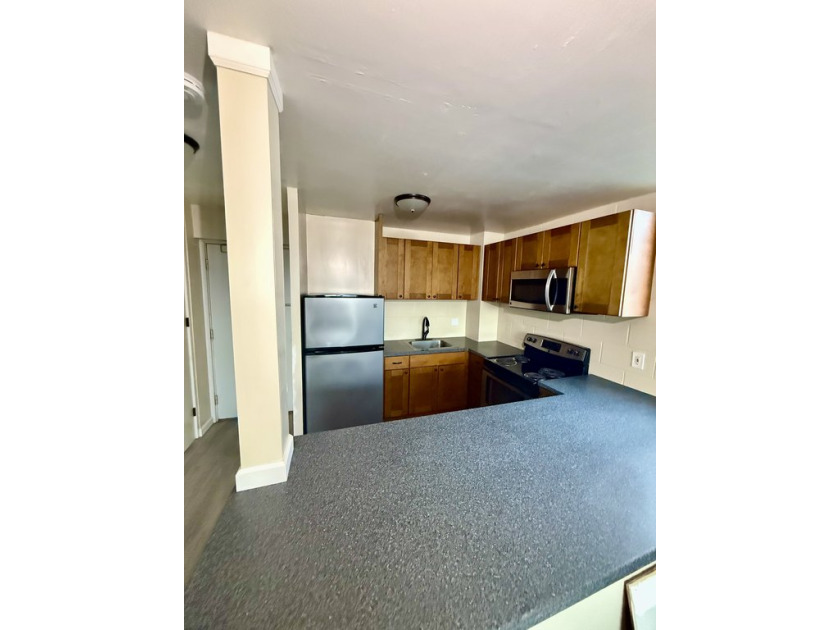 Situated in the heart of Lihue, this 2-bedroom, 1.5-bath condo - Beach Condo for sale in Lihue, Hawaii on Beachhouse.com