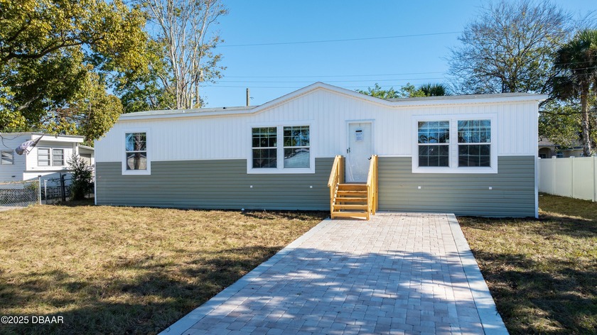 Absolutely beautiful, brand-new factory-built home offering - Beach Home for sale in Ormond Beach, Florida on Beachhouse.com