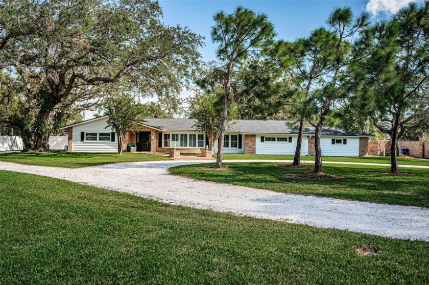 Spectacular private estate situated on 2.35 Acres of High and - Beach Home for sale in Clearwater, Florida on Beachhouse.com