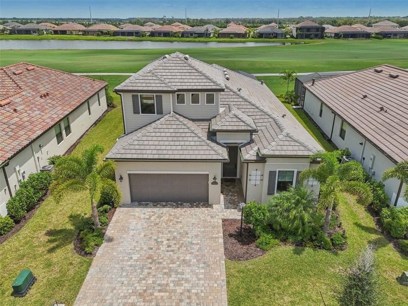 This expansive 2022-built Catalina model in Lakewood National - Beach Home for sale in Lakewood Ranch, Florida on Beachhouse.com