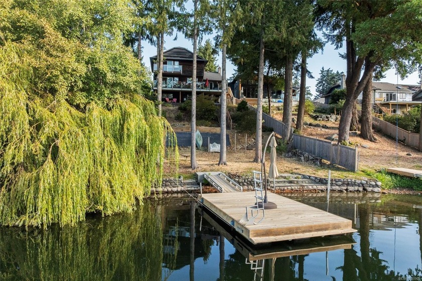 Escape to the lake with this rare opportunity. Nestled on the - Beach Home for sale in Langford,  on Beachhouse.com