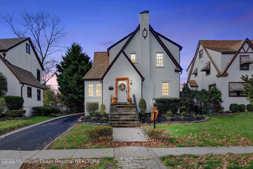 Nestled on a beautifully tree-lined street, this unique Tudor - Beach Home for sale in Ocean Township, New Jersey on Beachhouse.com