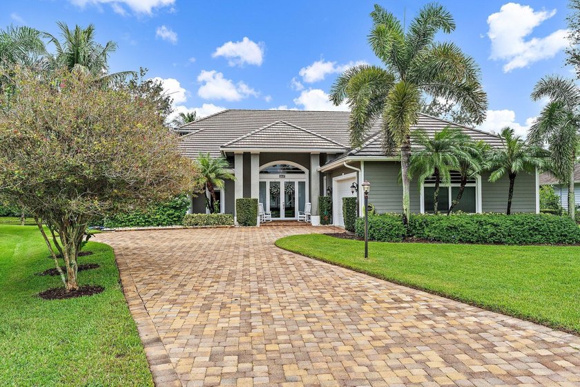 Small cozy enclave of just 173 home sites with lush tree lined - Beach Home for sale in Jupiter, Florida on Beachhouse.com