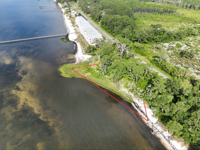 Imagine waking up to the serene sound of waves lapping against - Beach Lot for sale in Carabelle, Florida on Beachhouse.com