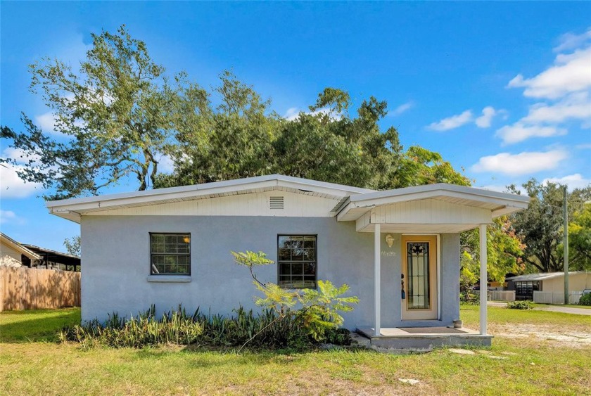 Welcome to this cozy mid-century gem, a delightful retreat - Beach Home for sale in Tampa, Florida on Beachhouse.com