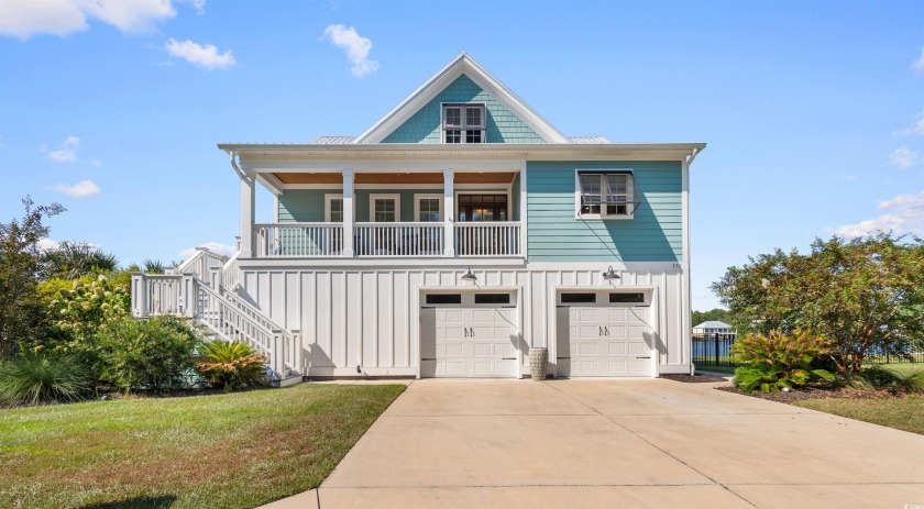 Welcome to this stunningly beautiful raised beach house in the - Beach Home for sale in Murrells Inlet, South Carolina on Beachhouse.com