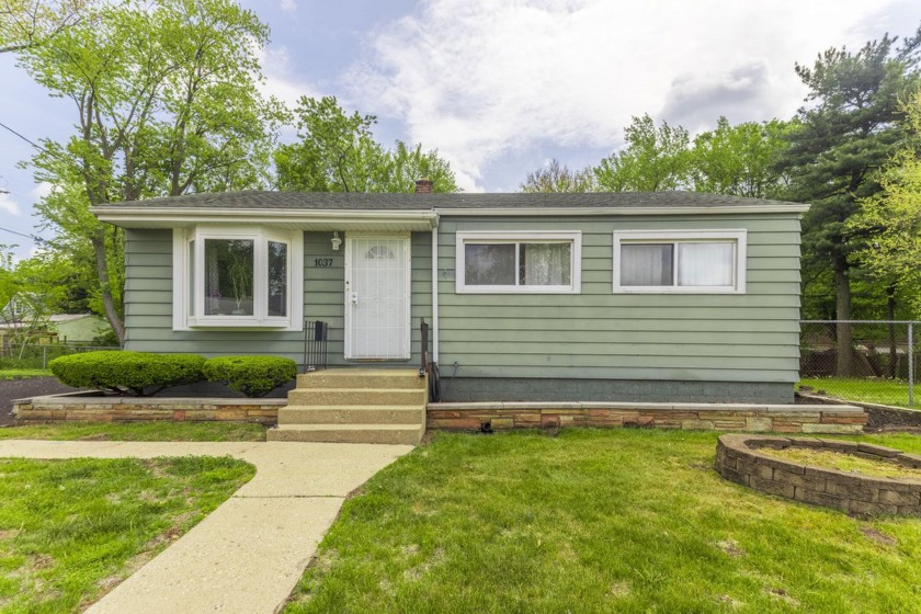 Welcome to 1037, a cozy ranch, with a basement, tucked away on a - Beach Home for sale in Gary, Indiana on Beachhouse.com