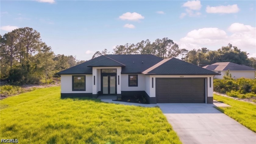 Experience modern elegance in this beautifully crafted 3-bedroom - Beach Home for sale in Lehigh Acres, Florida on Beachhouse.com