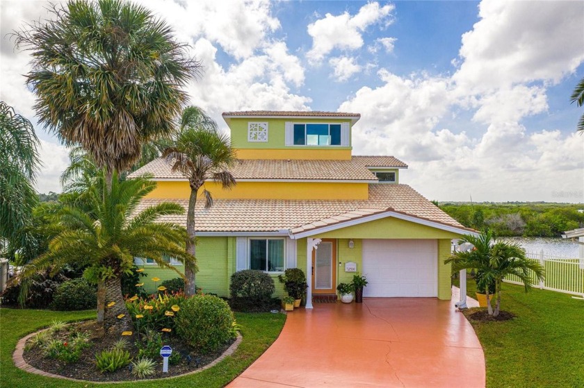 This incredible 4 bedroom, 3 and 1/2 bathroom, tri-story - Beach Home for sale in Hudson, Florida on Beachhouse.com