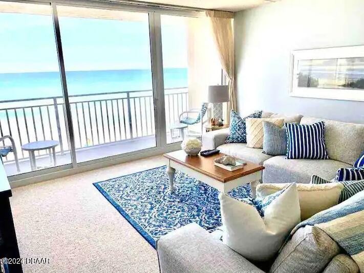 Introducing a BEACHFRONT OASIS: Fully Furnished Condo with - Beach Condo for sale in New Smyrna Beach, Florida on Beachhouse.com