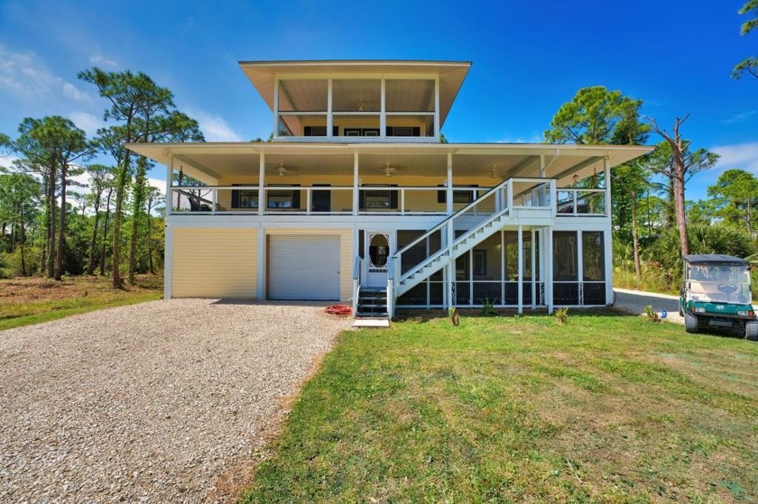 This renovated 7-bedroom, 4-bathroom home is the perfect - Beach Home for sale in St. George Island, Florida on Beachhouse.com