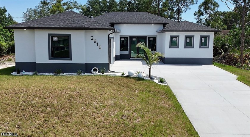 Welcome to this stunning new-build (2026) home on a spacious lot - Beach Home for sale in Lehigh Acres, Florida on Beachhouse.com