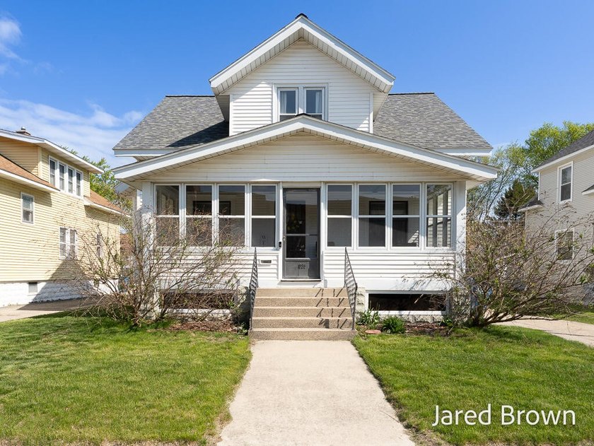Tastefully updated and full of character, this beautiful - Beach Home for sale in Grand Haven, Michigan on Beachhouse.com