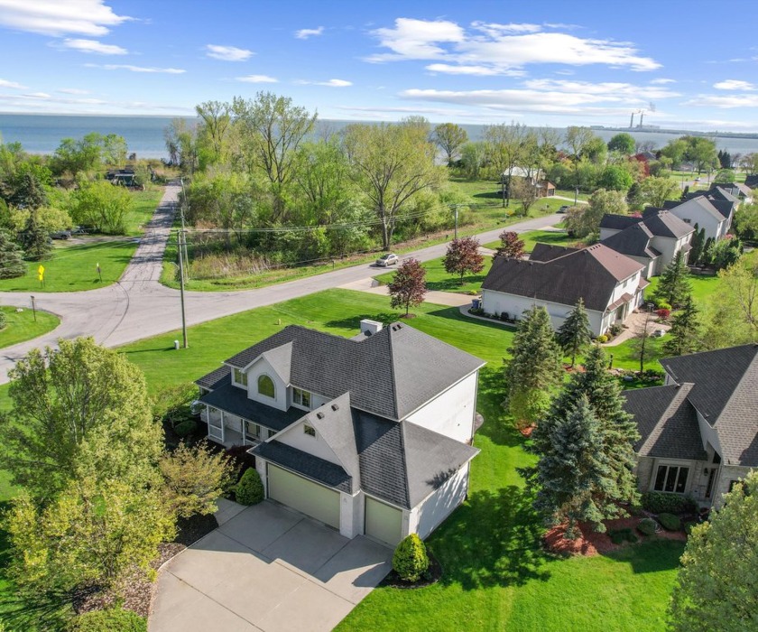 This beautifully cared-for 4-bedroom, 3.5-bath home offers - Beach Home for sale in Newport, Michigan on Beachhouse.com