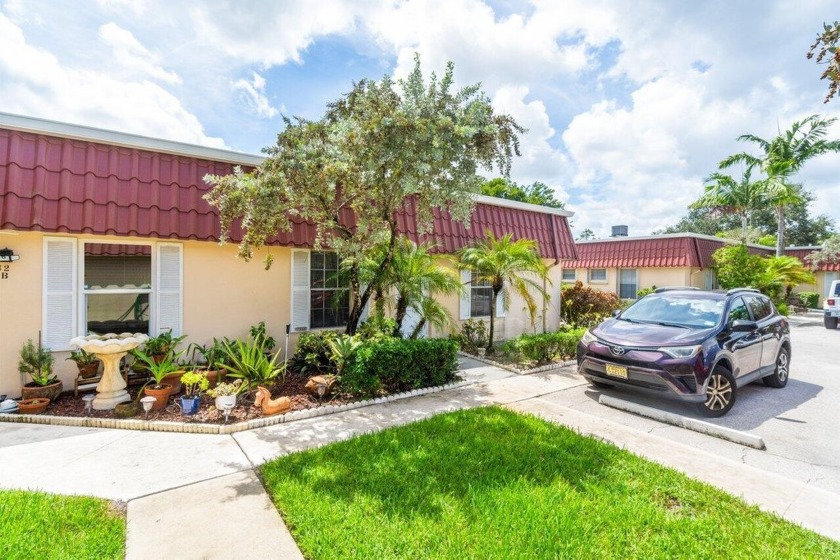 Welcome to your peaceful retreat in the highly sought-after 55+ - Beach Home for sale in Lake Worth, Florida on Beachhouse.com