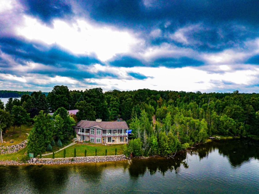 SECLUDED LONG LAKE ESTATE. There is certainly no shortage of - Beach Home for sale in Cheboygan, Michigan on Beachhouse.com