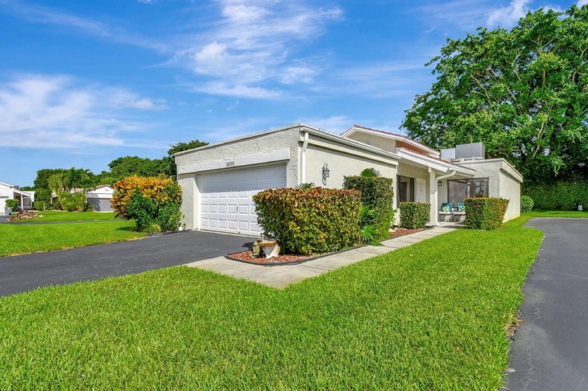 Step into this stunning home, situated on one of the largest and - Beach Home for sale in Boynton Beach, Florida on Beachhouse.com