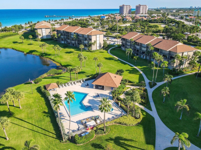 A rare offering with triple water views at privately-gated Ocean - Beach Condo for sale in Jupiter, Florida on Beachhouse.com